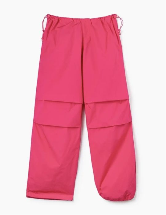 Ярко-розовые брюки