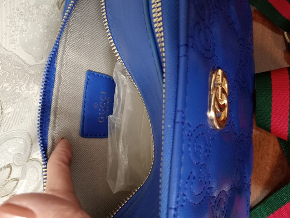 Клатч "Burberry", "Gucci".