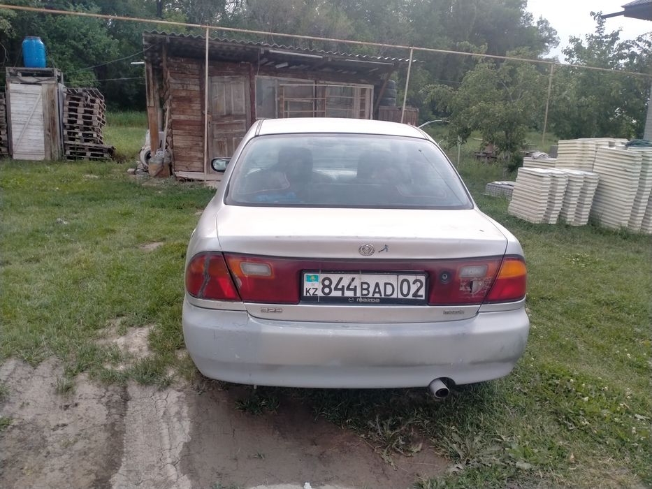Мазда 323 без горантия