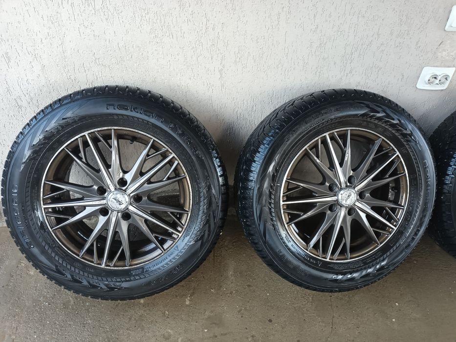 Roți cu cauciucuri de iarna  R17 folosite pe TIGUAN
