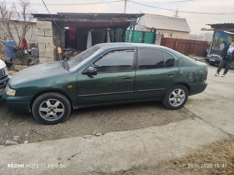 Ниссан примера р11