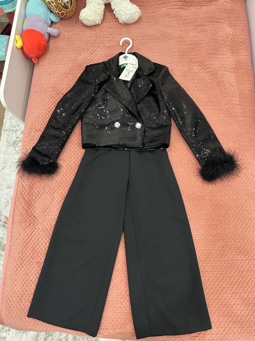 Новй Костюм на 7-8 лет