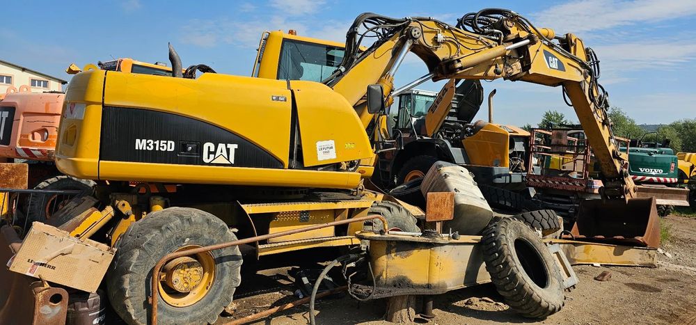 Caterpillar CAT M 315 D Excavator pe roti