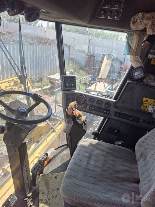 Комбайн Ню холланд Тс56