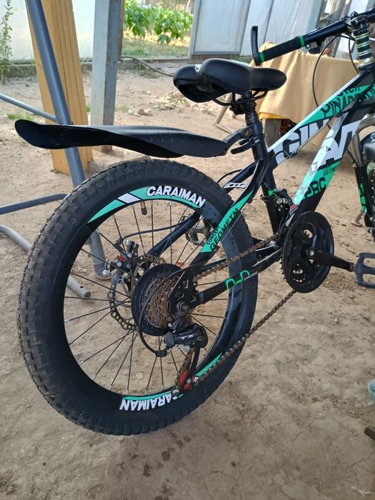 Giant Caraiman 20"frâne disc 21 viteze 7 și 12 ani.
