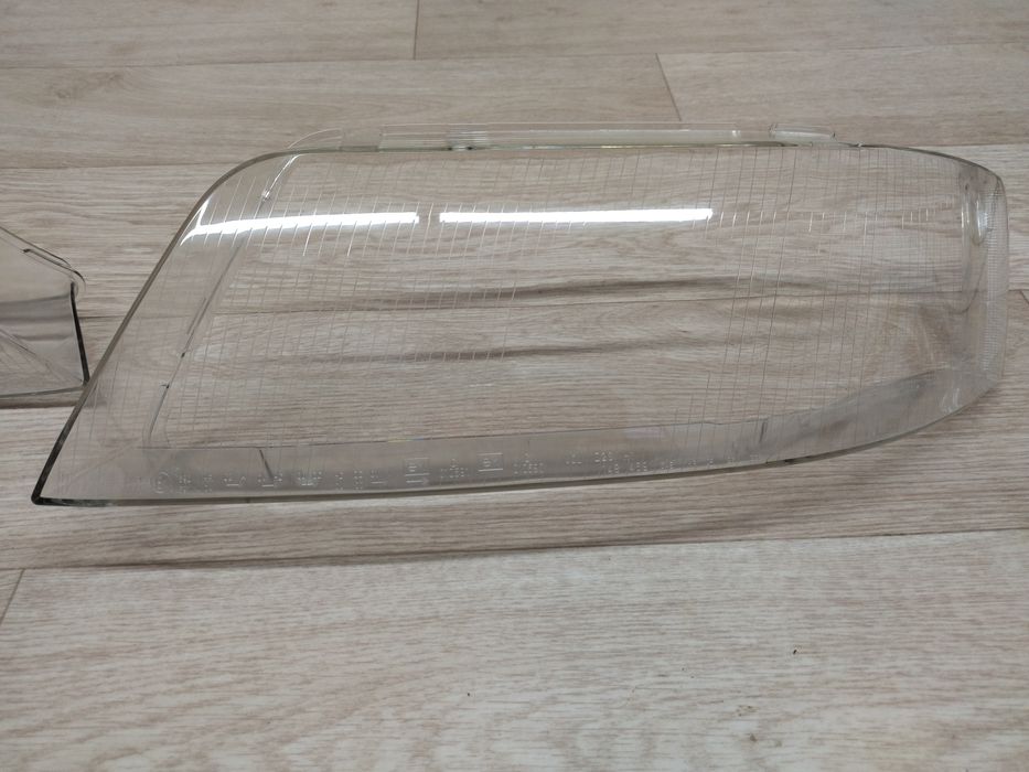 Стёкла на фары Ауди А6 с5