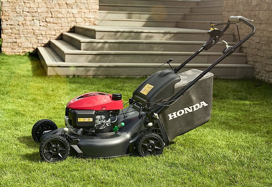 Стрижка Газон косилка бензин Газон уриш