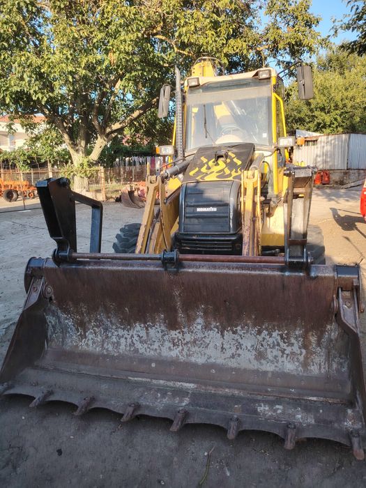 Продавам комбиниран багер