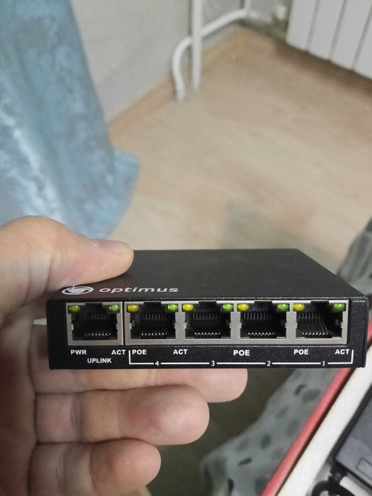 Коммутатор Optimus UM1-E5/4P mini