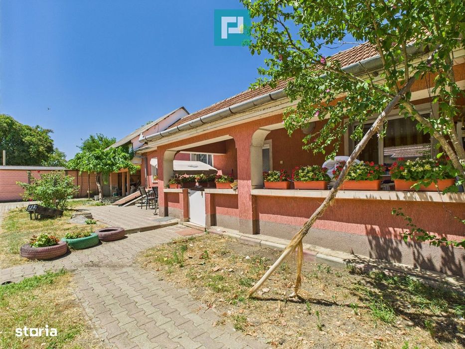Casă cu 2 camere și teren de 1450 mp în Aradul Nou