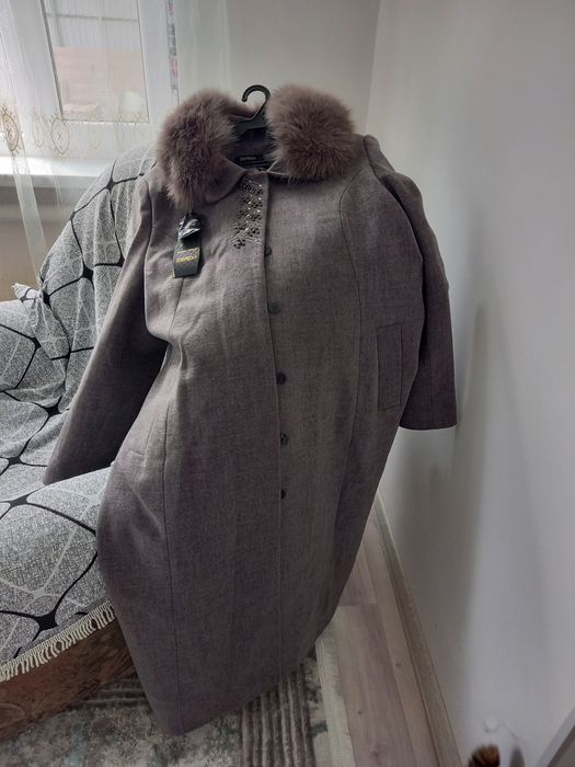 Продам пальто новое