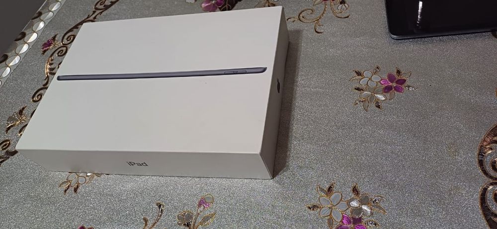 Планшкт Apple .  iPad .