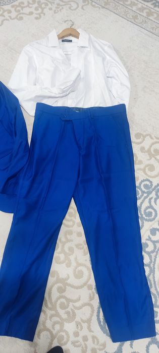 Продам костюм с брюками и рубашкой