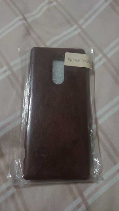 Оригинальный чехол и стекло для смартфонов Sony Xperia.