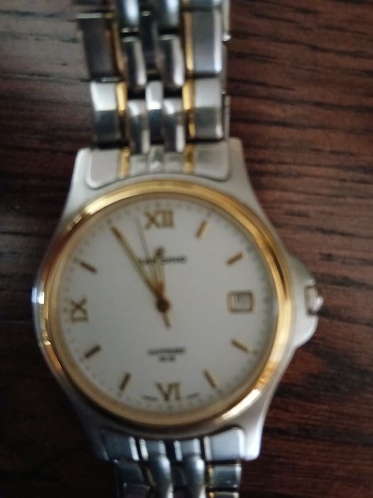 Ceas elvetian Candino Sapphire 50 M model 2086  ca nou
bratara metalic