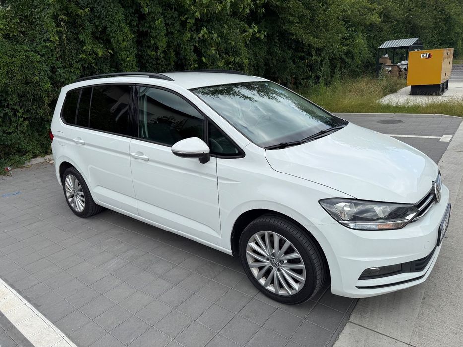 Volkswagen Touran Prim propietar cu verificare la reprezentanta km reali masina de Direc