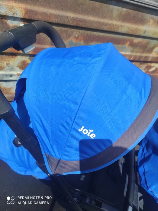 Коляска для погодок