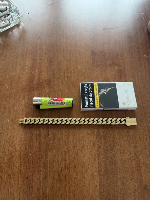 Bratara aur Cuban plina aur masiv 14 karate 100 grame lucrata manual