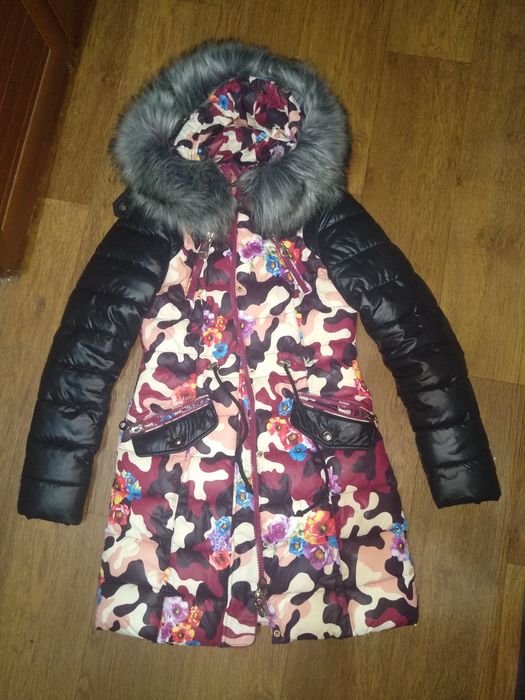 Продам женский пуховик