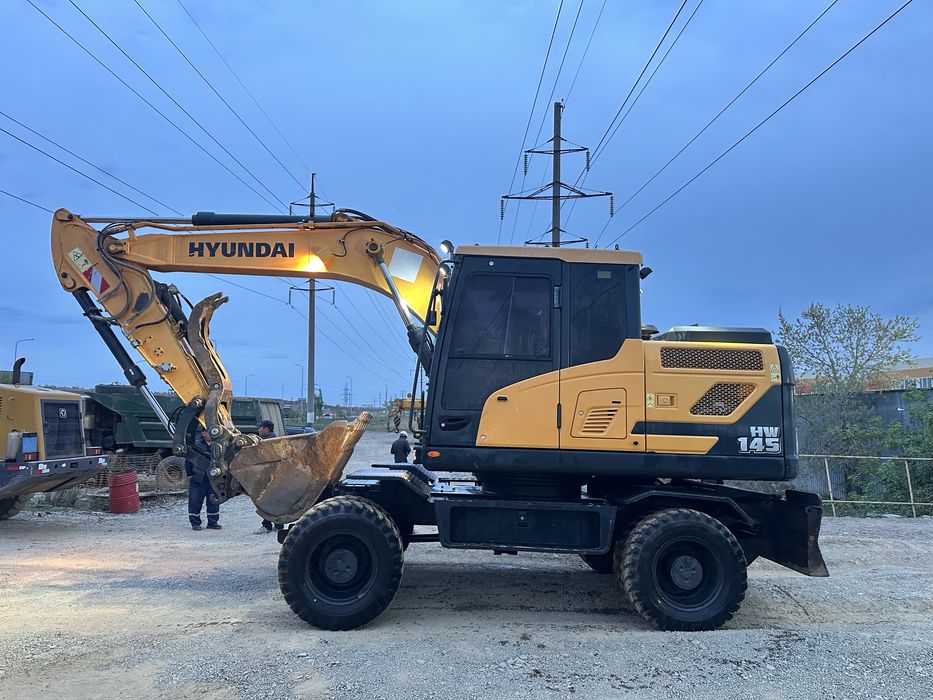 Услуги колесного экскаватора, недорого