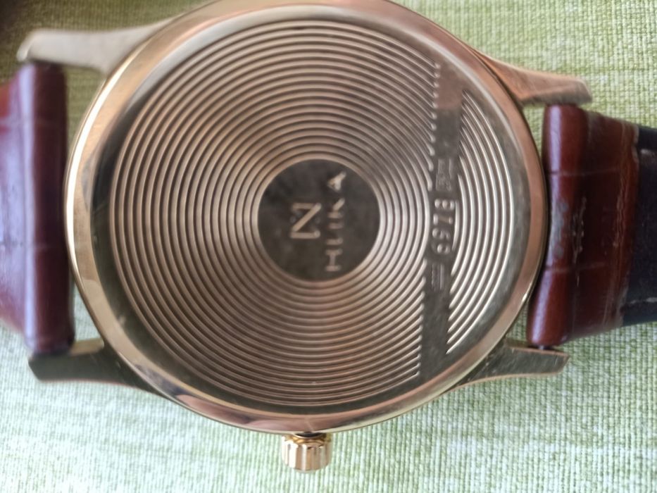 Золотые часы Ника