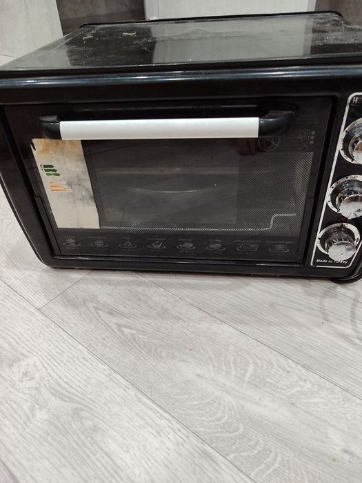 Продам духовку .