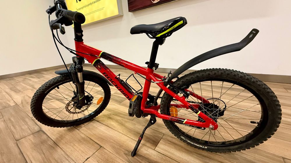 Vand bicicleta Rockrider 20', suspensie hidraulica fata, frâne pe disc, copii 5-8 ani, 900 RON
