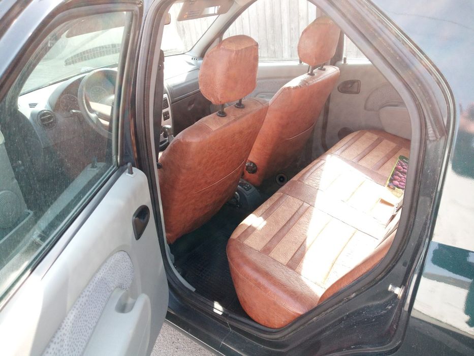 Vand Dacia Logan verde cameleon 1.6 mpi, 8v, 2006, full cu abs, oglinzi si geamuri electrice