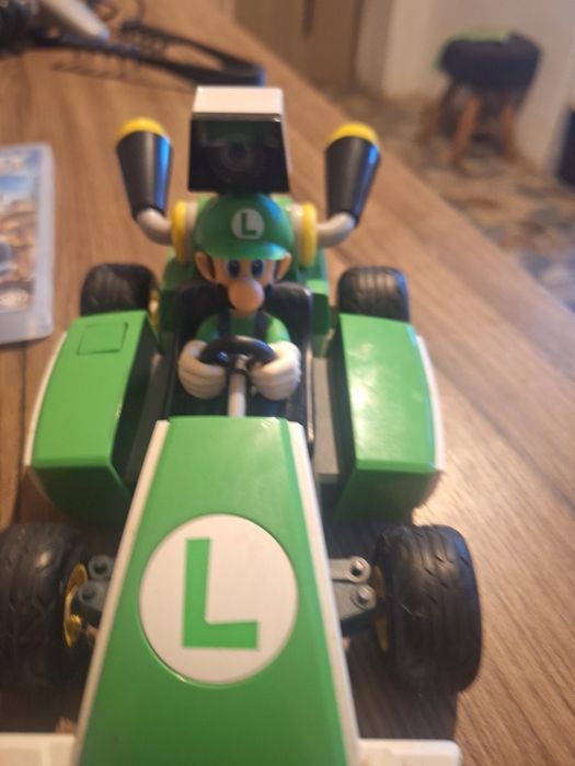Vând nintendo kart luigi și manetă + jocuri