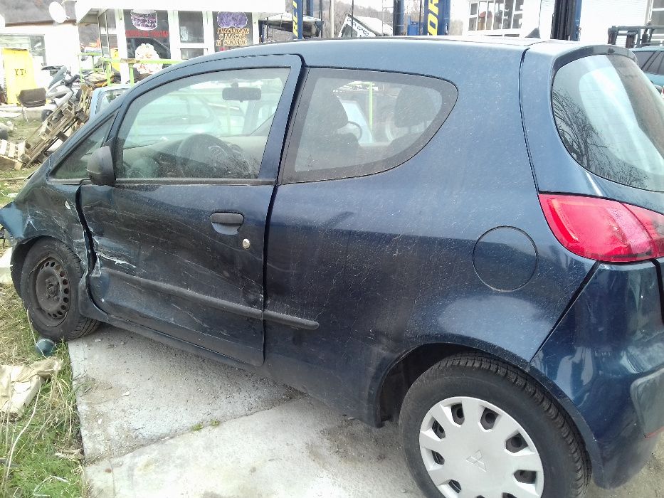 Mitsubishi Colt-1.2газ/бензин/75к.с./08г-на части