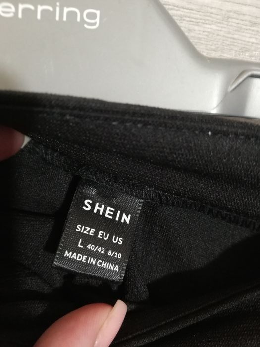 Pantaloni scuri femei