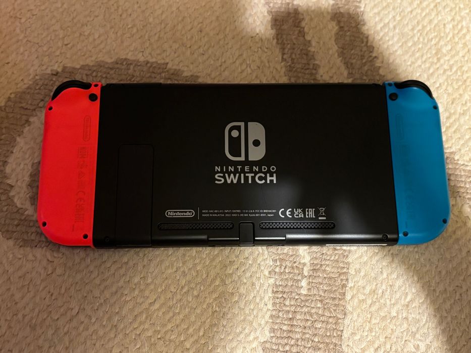Nintendo Switch V2 + 128 GB + Zelda Controller + Бонус игра“.