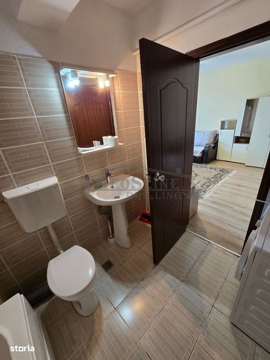 Apartament 1 cameră decomandată Bucătărie separată Parcare exterioară