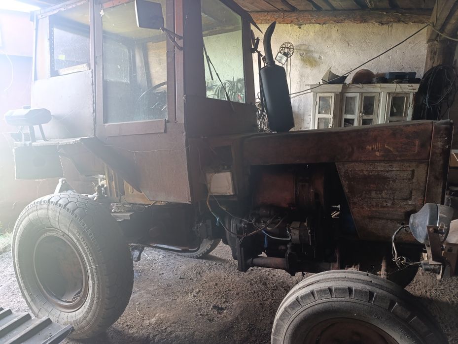 Продается дом и трактор с телегой