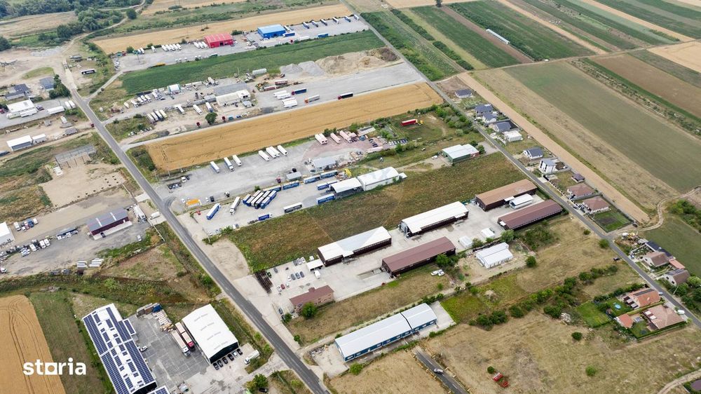 Proprietate industrială 5 hale, teren 21,105 mp, Santion,