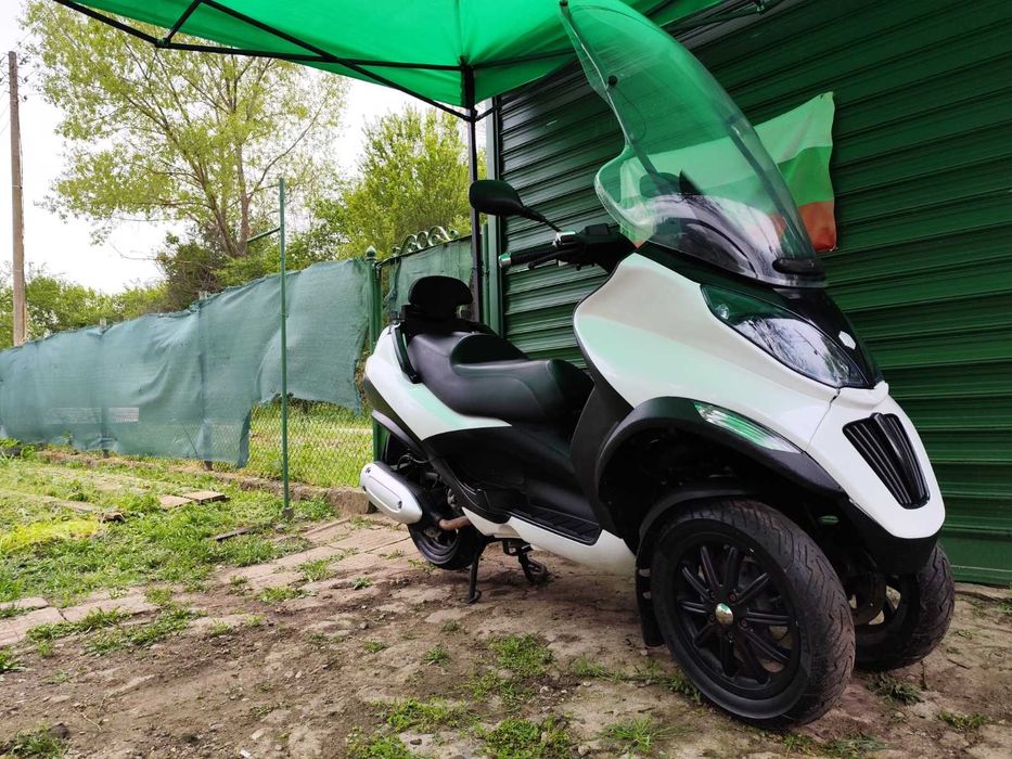 Пиаджо МП3 Piaggio MP3 300 кубика