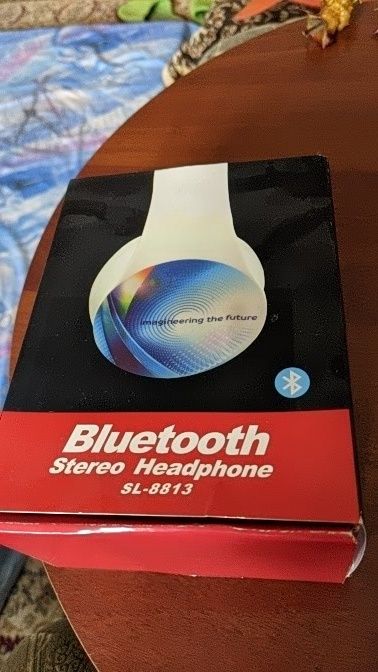 Продам новые bluetooth наушники