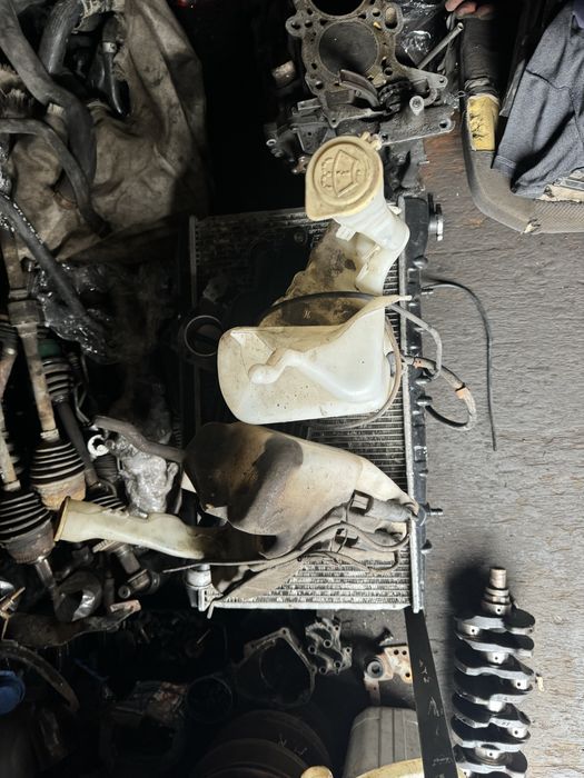 Mitsubishi каризма бачок омывателя