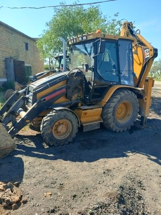 Продаю экскаватор-погрузчик CAT432D