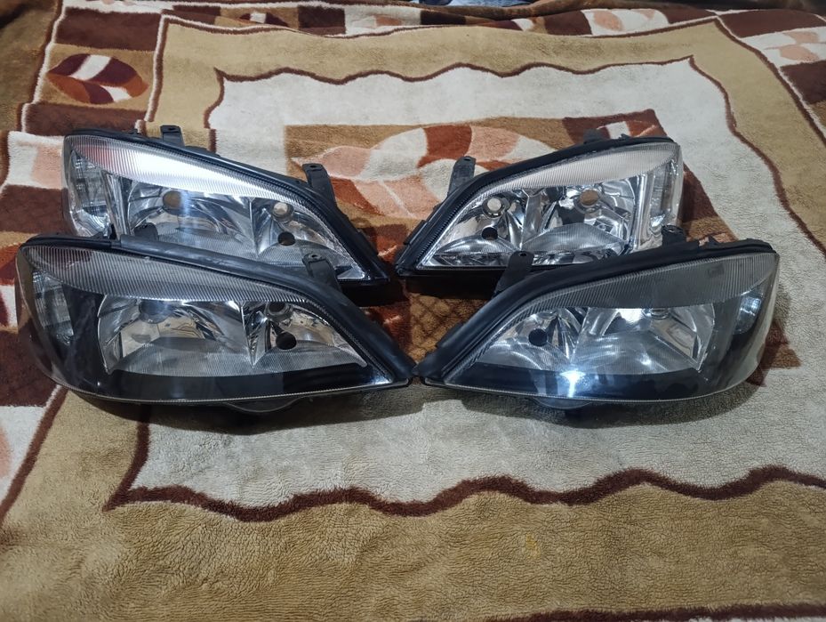 Фары на Опель астра Джи