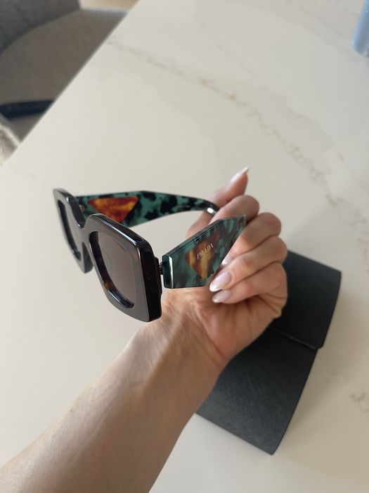 PRADA Temple tortoiseshell-effect sunglasses