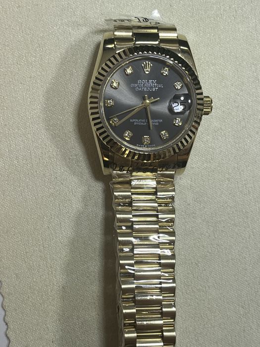 Rolex Date Just de dama 28mm