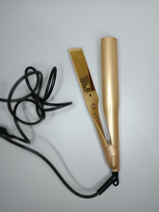 Уред за изправяне и къдрене на коса