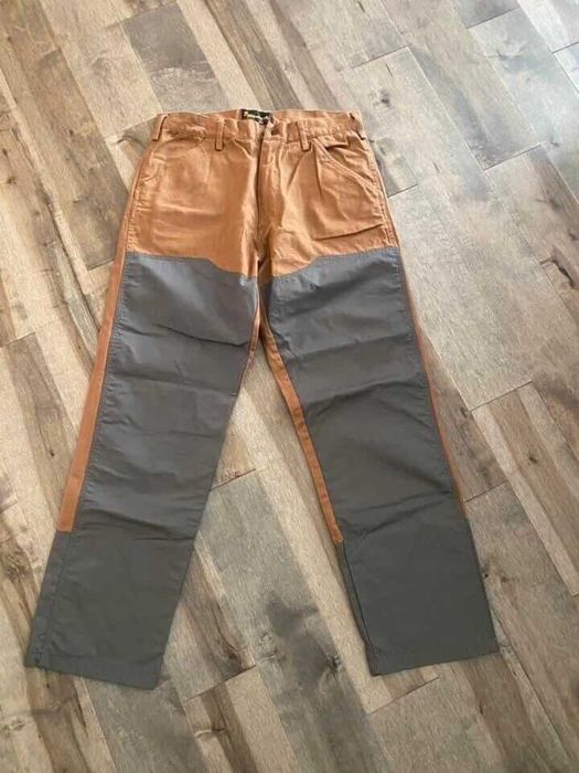 Несколько охотничьих брюк BROWNING и защитные фартуки от колючек.