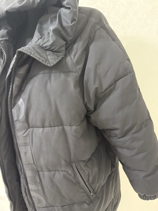 Женский пуховик.