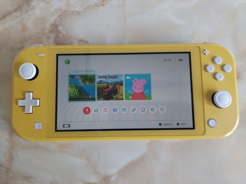 Vând consolă Nintendo Switch Lite pe galben [perfect funcțională] //poze reale