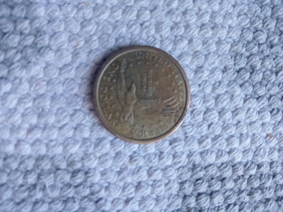 Vand moneda colecționarilor 1 dolar an 2000