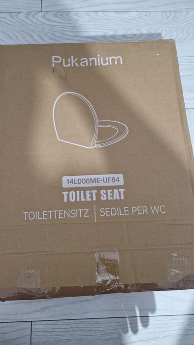 Capac wc inteligent cu bideu si telecomandă.