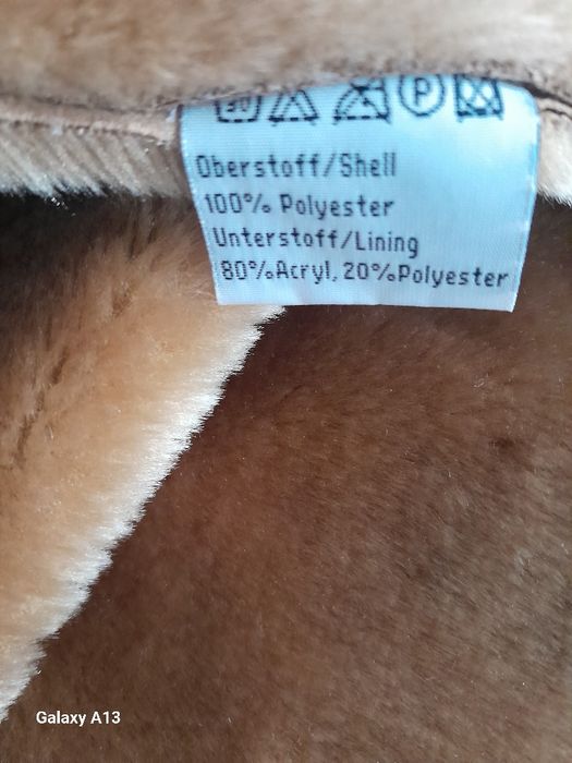 Haină blanita artificială L