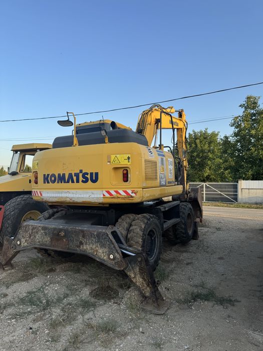 Excavator komatsu pe roți
